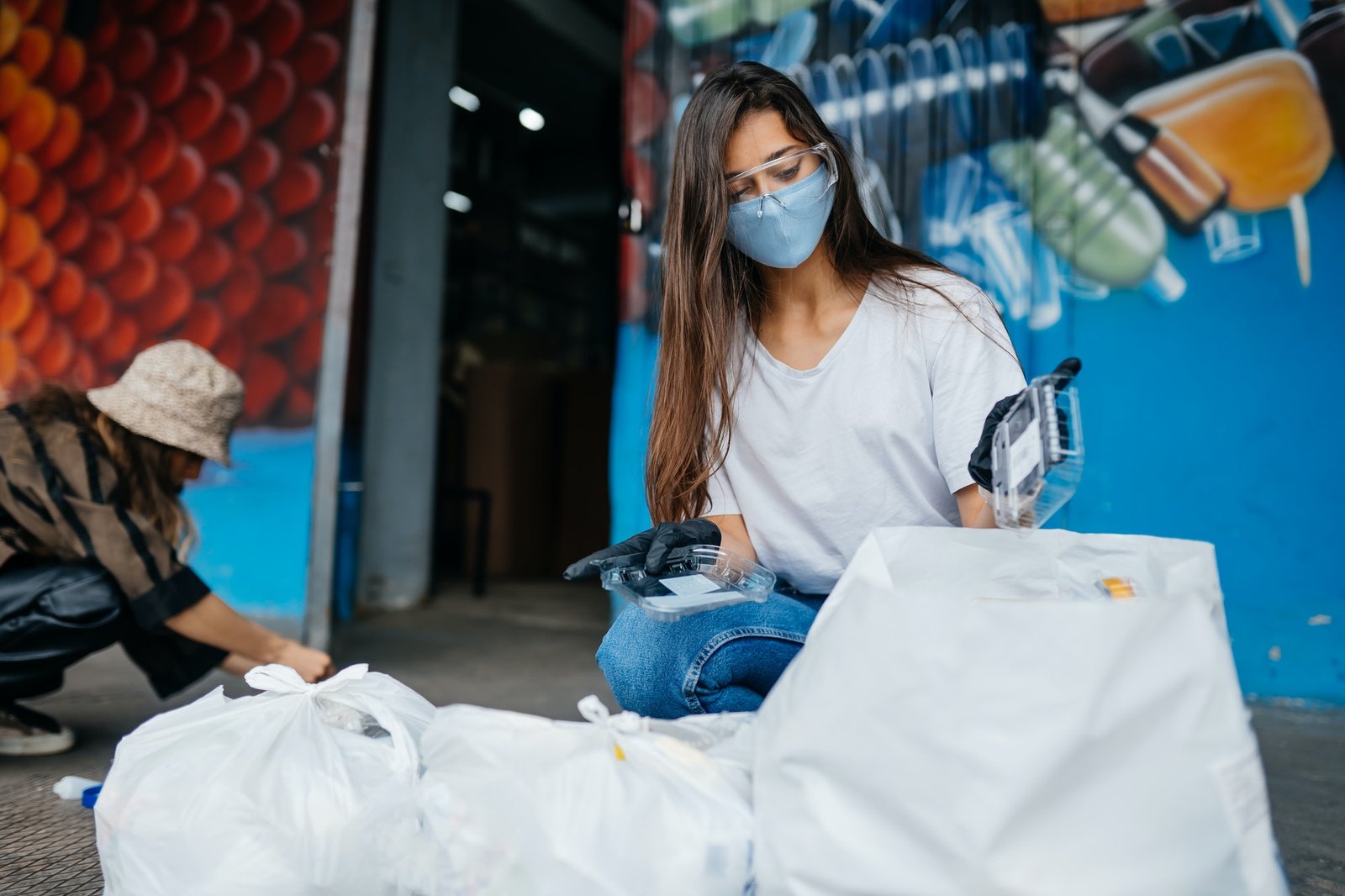 young-woman-sorting-garbage-concept-of-recycling-zero-waste.jpg